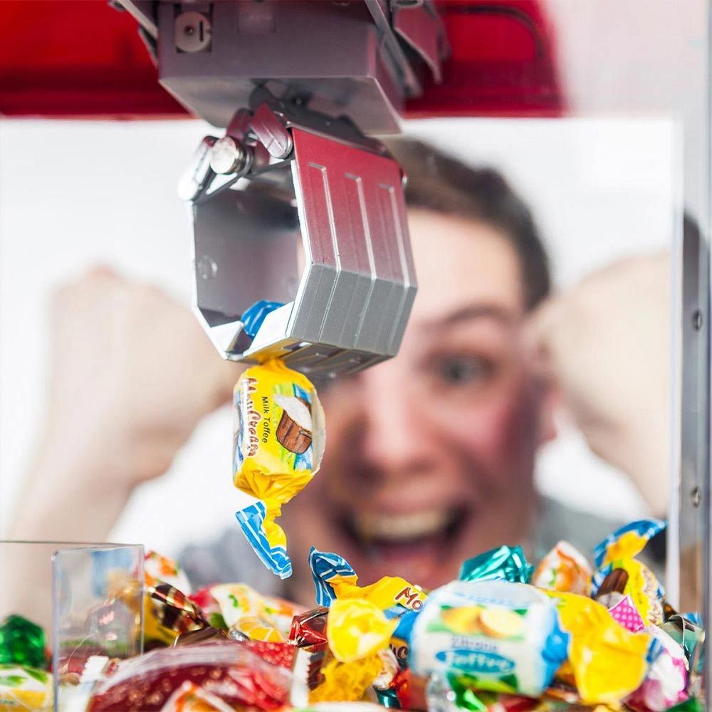 Grab Candy ou distributeur de machine à jouets pour saisir des bonbons ou des bonbons