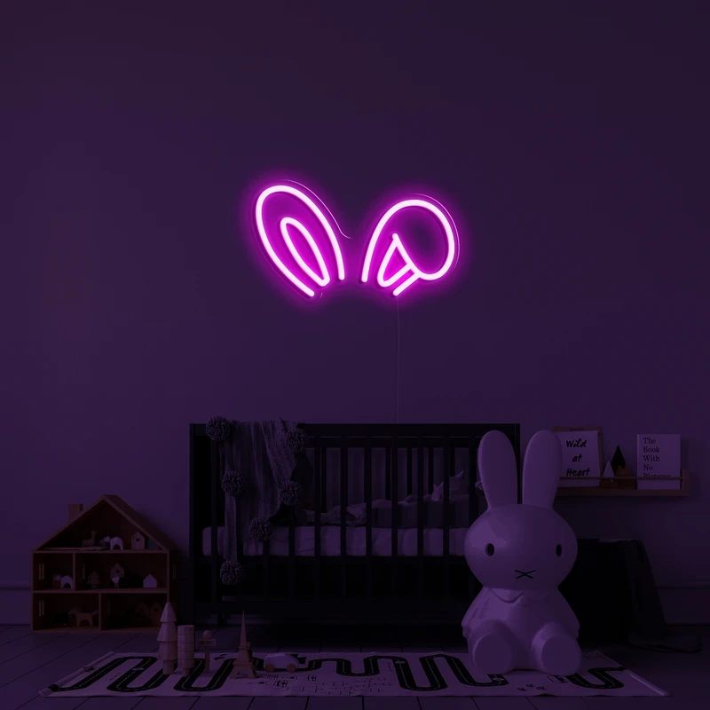 Logo néon lumineux 3D sur un mur - oreilles de lapin
