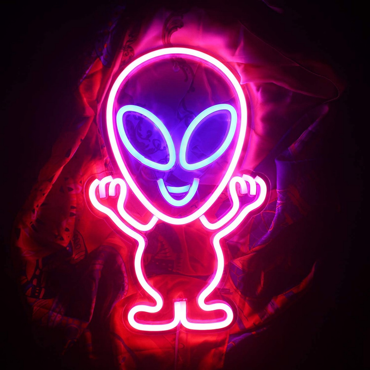 logo néon led brillant sur le mur - extraterrestre